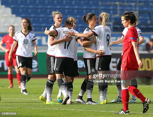 Isabel Kerschowski of Germany is hugged by her teammates as they celebrate their goal against Turkey during UEFA Women's Euro 2017 Qualifier match...