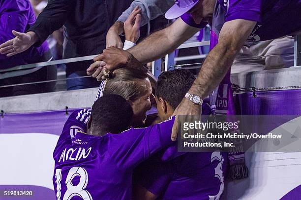 Brek Shea, Seb Hines, and Kevin Molino of Orlando City SC celebrate a goal against the Portland Timbers at the Citrus Bowl on April 3, 2016 in...