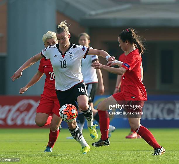 Alexandra Popp of Germany controls the ball past Gizem Gonultas and Cansu Yag of Turkey during UEFA Women's Euro 2017 Qualifier match between Turkey...