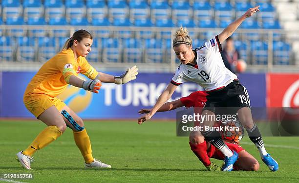 Svenja Huth of Germany battles for the ball against with Bahar Guvenc of Turkey during UEFA Women's Euro 2017 Qualifier match between Turkey and...