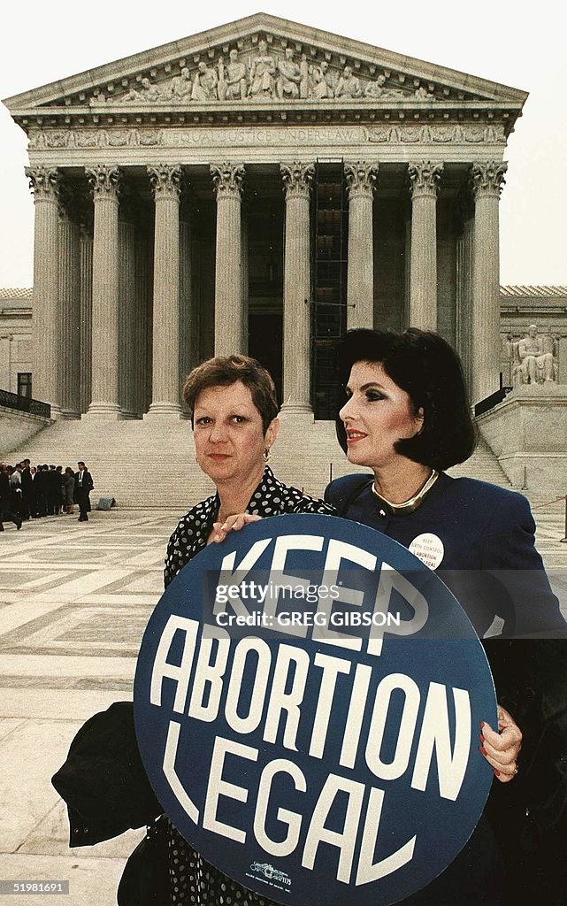 This file photo shows Norma McCorvey(L) formally k