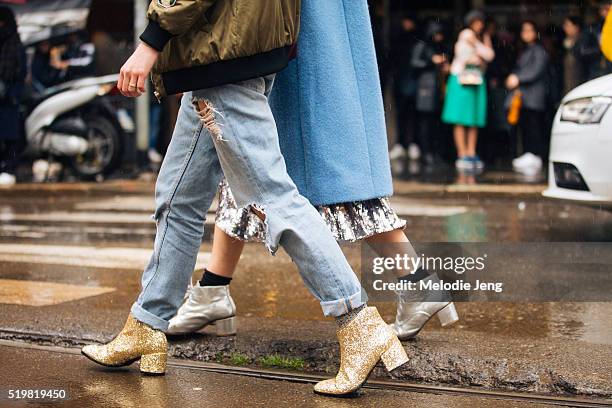 Gold glitter booties spotted at the Dolce & Gabbana show at Metropol during Milan Fashion Week Fall/Winter 2016/17 on February 28, 2016 in Milan,...
