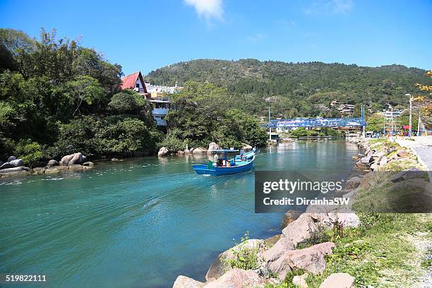 channel at barra da lagoa beach - lagoa barra stock pictures, royalty-free photos & images