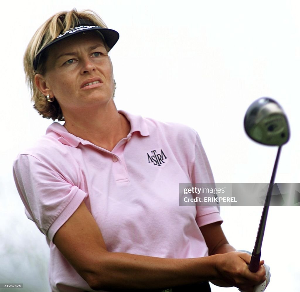 Golfer Liselotte Neumann of Sweden watches her tee