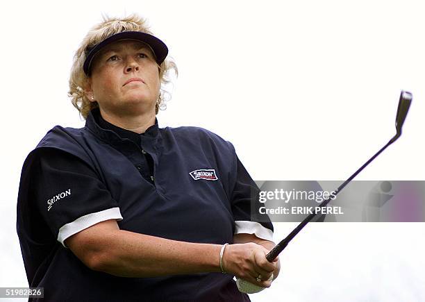 Golfer Laura Davies of England watches her tee shot on the 10th hole 1 June 2001 during the second round of the US Women's Open at the Pine Needles...