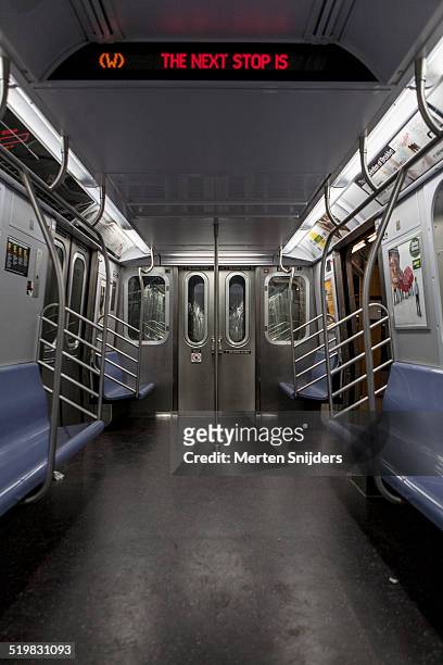 open door on empty subway car - new york subway train fotografías e imágenes de stock