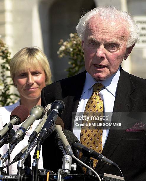 Rep. Tom Lantos speaks to the media against Beijing's bid for the 2008 Olympics outside the US Capitol in Washington, DC, 10 July 2001. Behind him is...