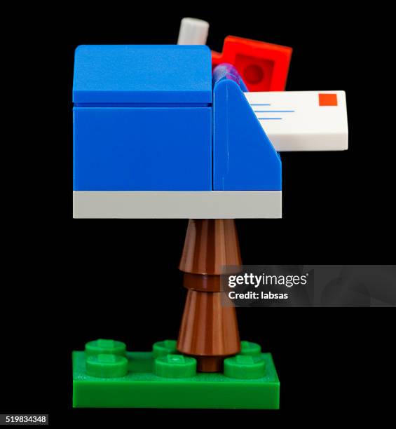 studio shot of a lego mini figure, mail box. - lego box stock pictures, royalty-free photos & images