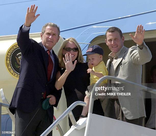 President George W. Bush waves with three-time winner of the Tour de France, Lance Armstrong , wife Kristin and son Luke as they deplane from Air...