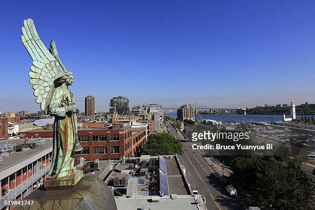 angel statue and old port - montreal clock tower stock pictures, royalty-free photos & images