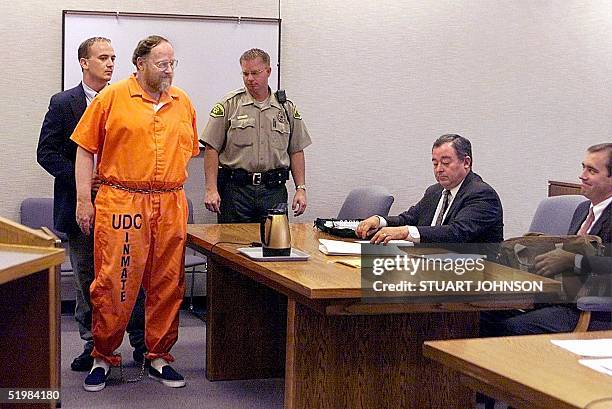 Tom Green , convicted on four counts of bigamy and one count of criminal nonsupport, smiles at prosecuting attorney David Leavitt 04 September at the...