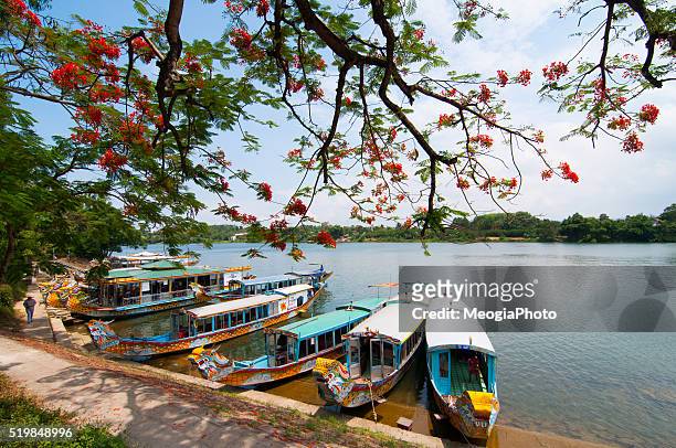 a boat station at perfume river (huong river) near thien mu pagoda, hue, vietnam - vietnam stock pictures, royalty-free photos & images