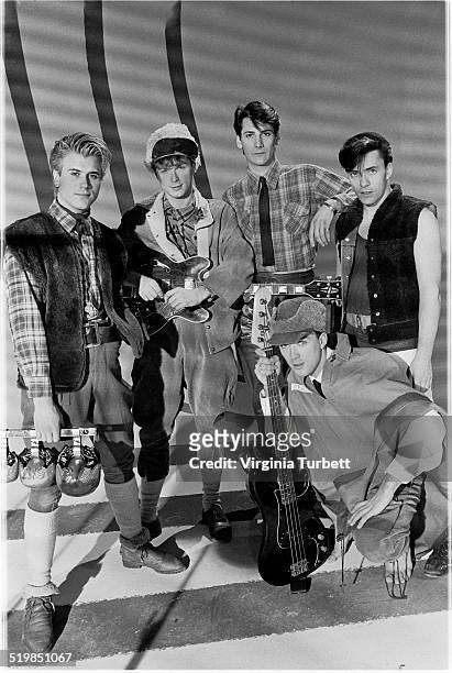 Steve Norman, Gary Kemp, Tony Hadley, Martin Kemp, John Keeble of Spandau Ballet during a video shoot for their single 'Instinction', 12th March 1982.