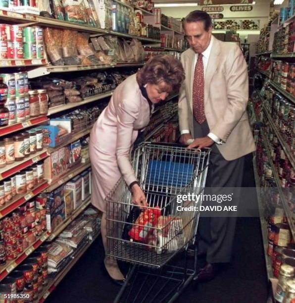 Republican presidential candidate Bob Dole and his wife, Elizabeth, grocery shop in Bal Harbour, Florida, 19 May. The Doles stopped at the market...