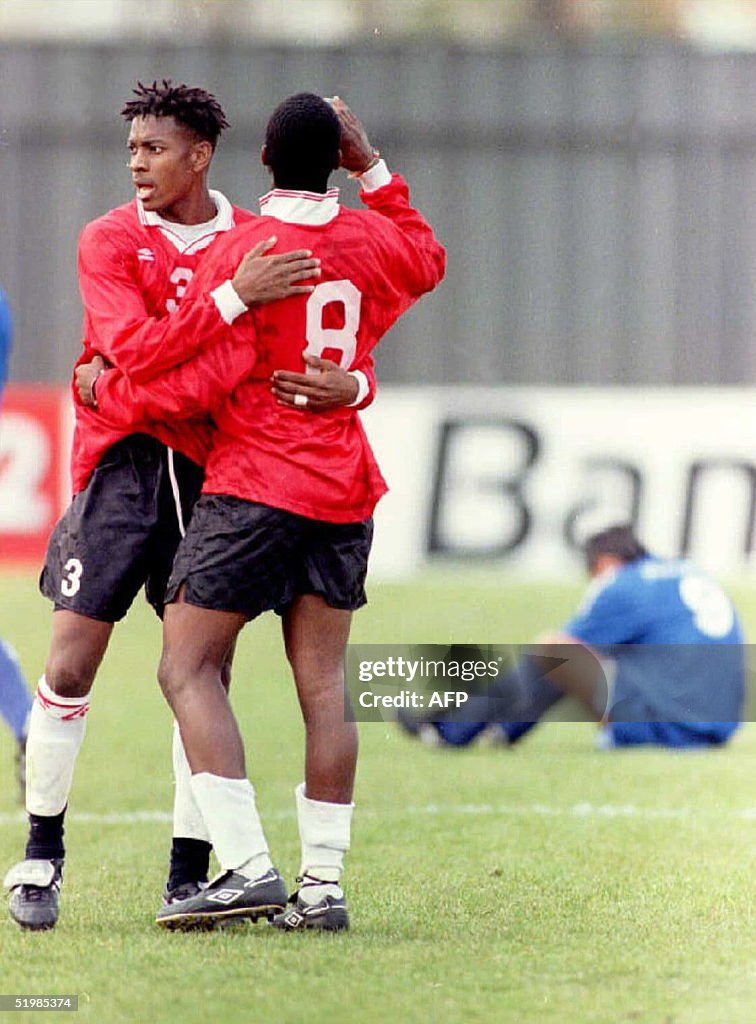 Avery John (L), and teammate Stern John, from Trin