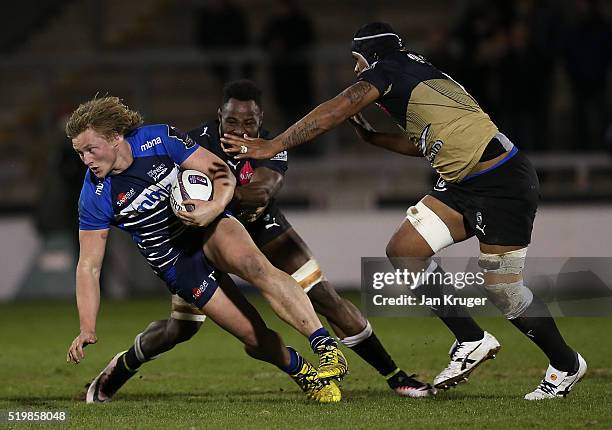Tommy Taylor of Sale Sharks evades the tackle of Akapusi Qera of Montpellier during the European Rugby Challenge Cup Quarter Final match between Sale...
