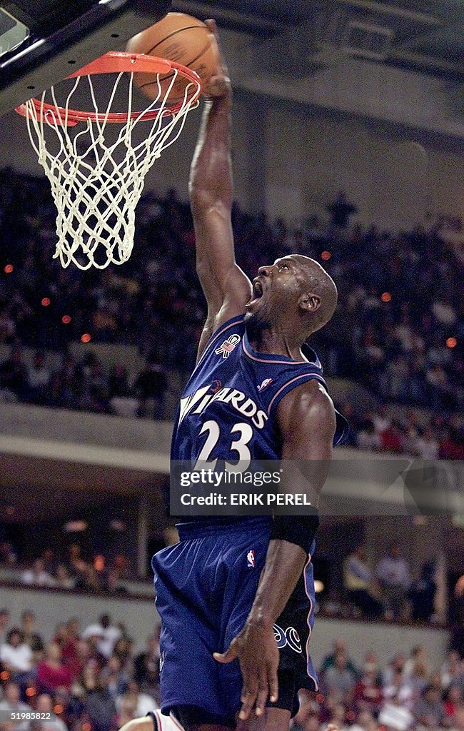 The Washington Wizards' Michael Jordan slam dunks
