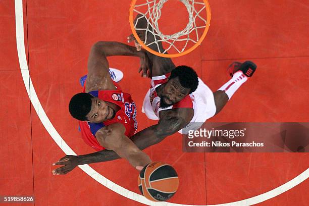 Kyle Hines, #42 of CSKA Moscow competes with Othello Hunter, #5 of Olympiacos Piraeus during the 2015-2016 Turkish Airlines Euroleague Basketball Top...