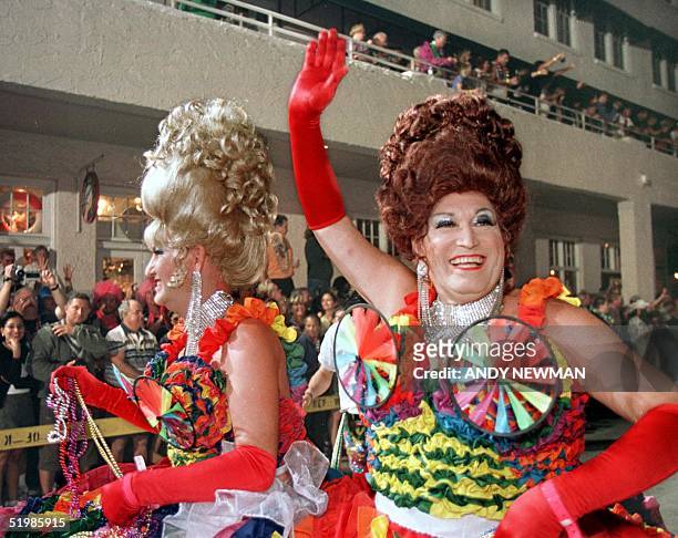 The Bitch Sisters, portrayed by female impersonators Kelly Summers Scott Fuhriman roll down Duval Street in Key West, Florida, late 27 October 2001,...