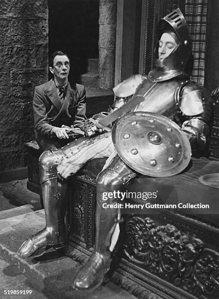 Briish actors Charles Hawtrey as Percy Thorne, and Claude Hulbert as Hilary Teasdale, in a scene from the Will Hay comedy 'The Ghost of St....