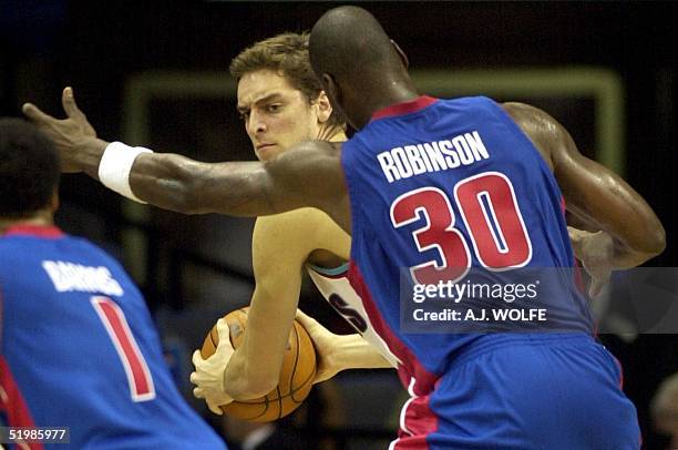 Memphis Grizzlies' Pau Gasol of Spain is guarded by Detroit Pistons' Clifford Robinson in the third quarter of the Pistons 90-80 win at the Pyramid...