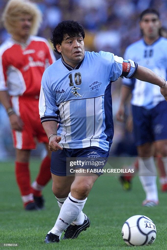 Diego Maradona is seen kicking the ball in Buenos