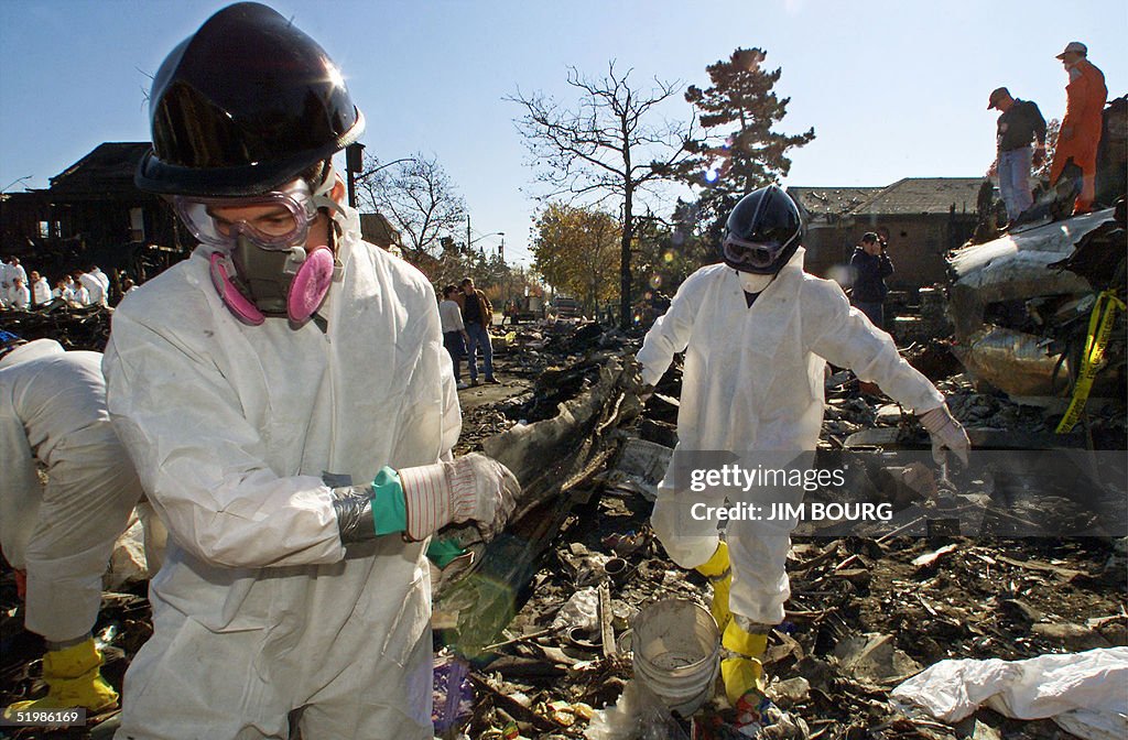 New York City firefighters in protective gear retr