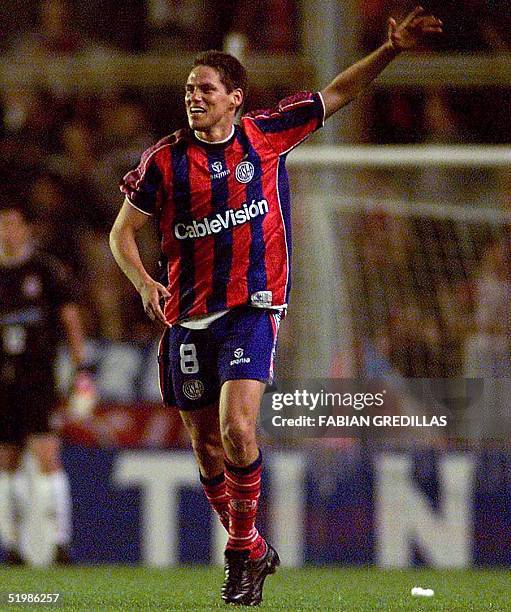 San Lorenzo's Guillermo Franco celebrates the second goal scored by his team against the Corinthians of Brazil during their semi-final Mercosur match...