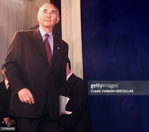 Argentine President Fernando de la Rua arrives at the Casa Rosasda prior to his address calling for a government of national unity 20 December 2001...