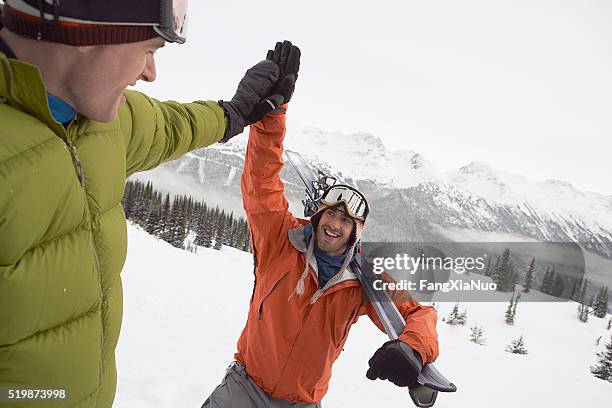 skiers in the mountains - ski high five stock pictures, royalty-free photos & images