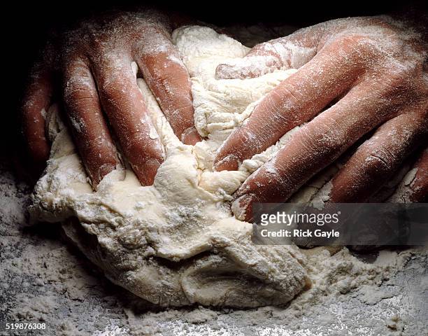 hands kneading dough - baker occupation stock pictures, royalty-free photos & images