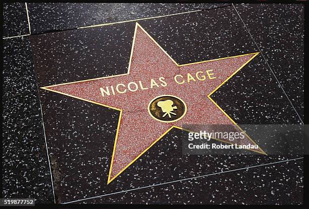 nicolas cage's star on hollywood boulevard - hollywood stars stock-fotos und bilder