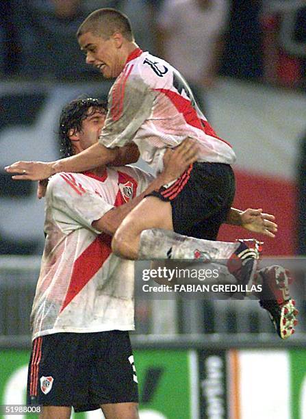 River Plate players Andres Dalesandro and Alejandro Dominguez , celebrate the fourth goal against the Juniors of Argentina, 12 May 2002. Alejandro...