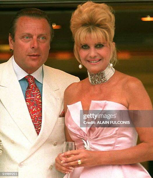 Ivana Trump poses for photographers with her husband, Ricardo Mazzuccelli on the deck of 32-meter-yacht during a party for the christening of the...