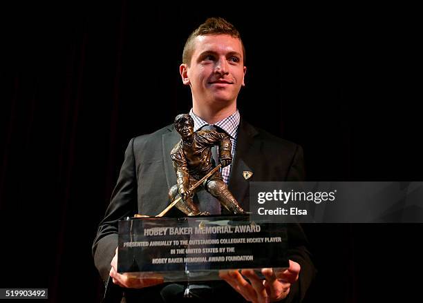 Jimmy Vesey of Harvard University and Hobey Baker Award winner poses with the trophy after the 2016 Hobey Baker Memorial Award ceremony at Tampa...