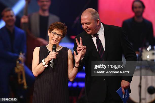 Governor of Saarland Annegret Kramp-Karrenbauer speaks as moderator Joerg Thadeusz looks on during the 52th Grimme Award on April 8, 2016 in Marl,...