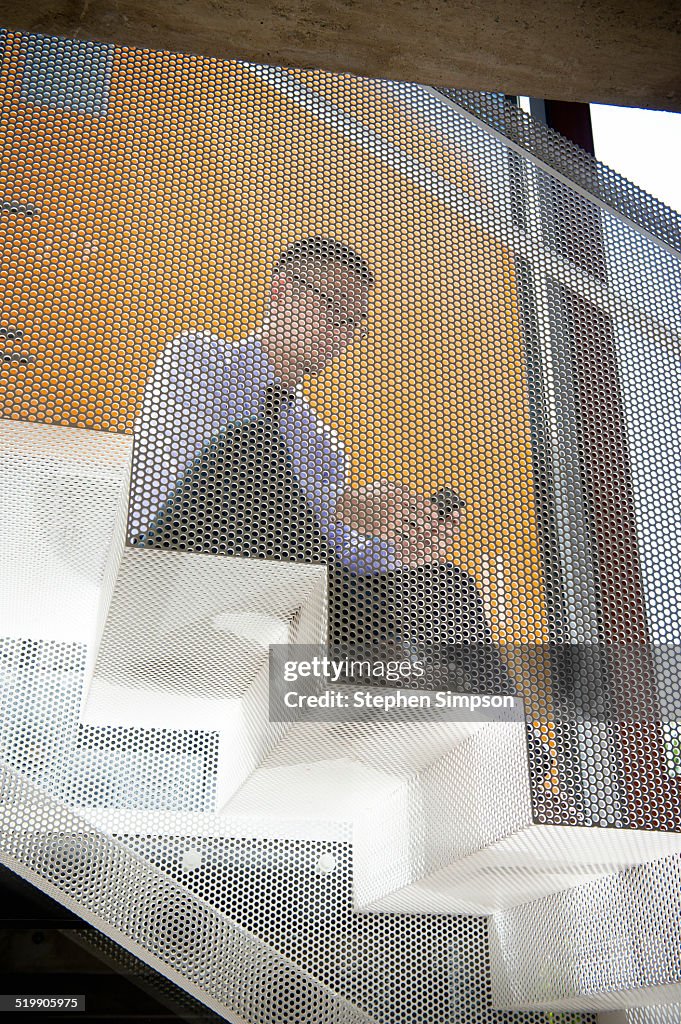 Businessman on phone in architectural office