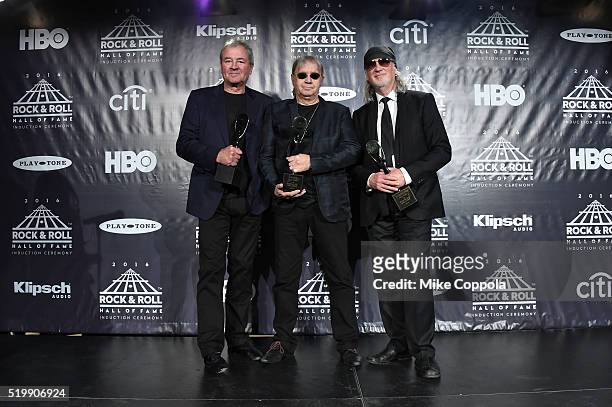 Ian Gillan, Ian Paice, and Roger Glover of Deep Purple pose on stage in the press room at the 31st Annual Rock And Roll Hall Of Fame Induction...