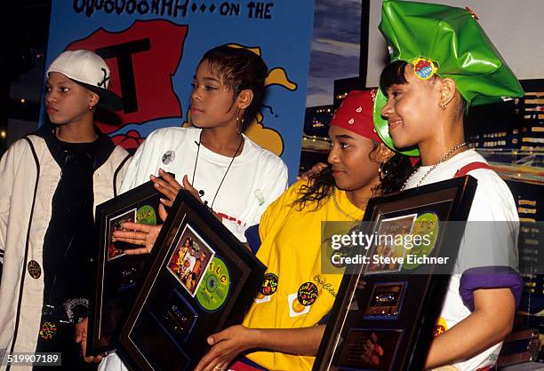 Tionne 'T-Boz' Watkins, Rozonda 'Chilli' Thomas, and Lisa 'Left Eye' Lopes of TLC at Gold record presentation, New York, April 15, 1992.