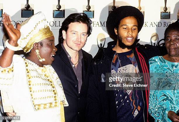 Rita Marley, Bono of U2, and Ziggy Marley attend Rock and Roll Hall of Fame at Waldorf Astoria, New York, New York, January 19, 1994.
