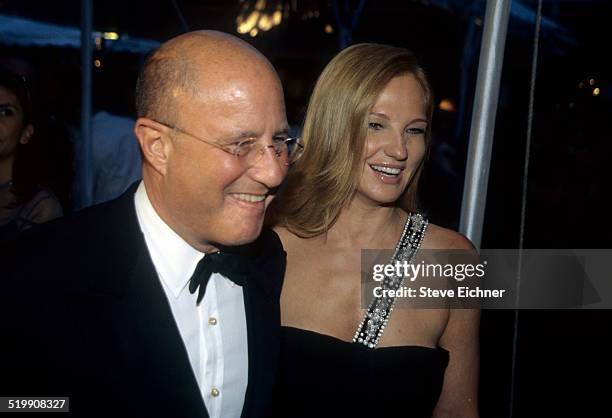 Ron Perelman and Ellen Barkin at event, New York, 1990s.