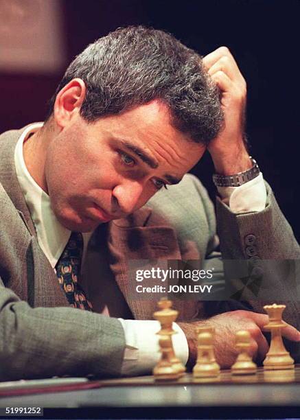 Chess challenger Gary Kasparov scratches his head 26 September in New York at the start of the tenth game with Indian player Vishi Anand. Anand won...
