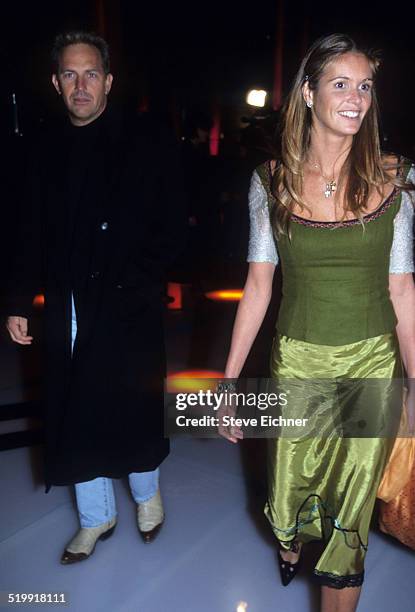Kevin Costner and Elle Macpherson at Sean 'Puffy' Combs' birthday party, New York, November 4, 1998.