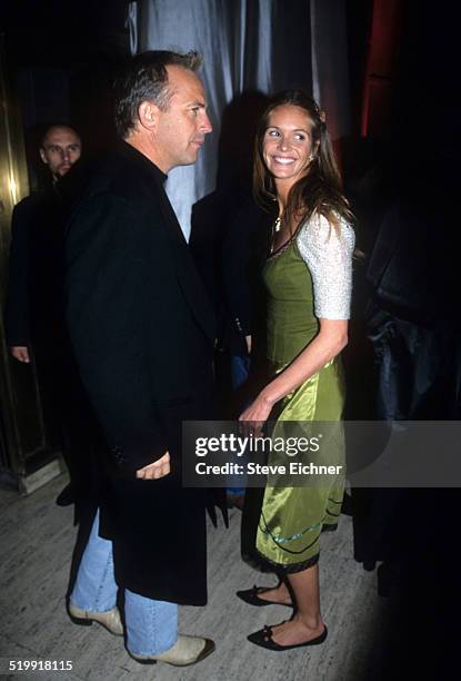 Kevin Costner and Elle Macpherson at Sean 'Puffy' Combs' birthday party, New York, November 4, 1998.