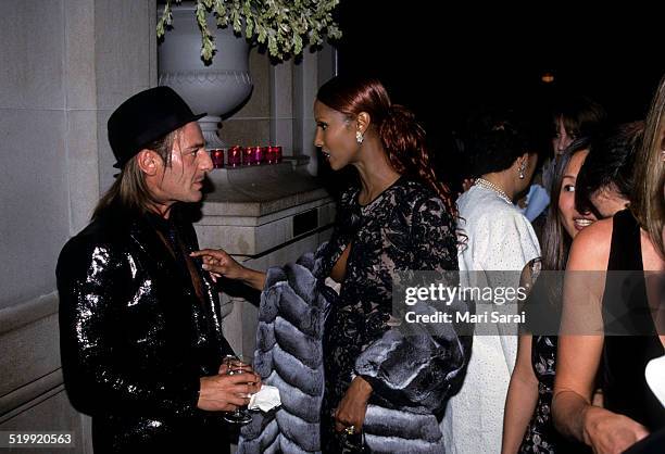 John Galliano and Iman at the Metropolitan Museum's Costume Institute gala exhibition, New York, New York, 1999.