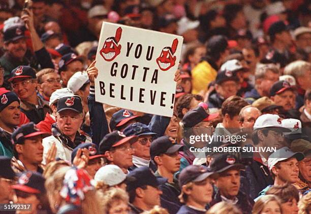 Cleveland Indians fan in the crowd at Cleveland's Jacobs Field holds up a sign reading "Ya Gotta Believe" at the start of game three of the World...