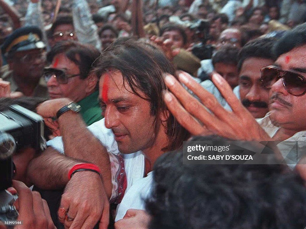 Movie star Sanjay Dutt, 36, is mobbed by fans as h