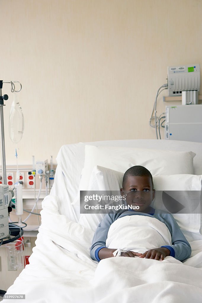Boy in a hospital bed