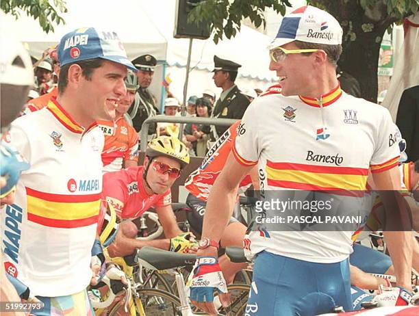 Five-time Tour de France winner Miguel Indurain of Spain talks to his teammate Abraham Olano, before the start of the Men's Individual Road Race...