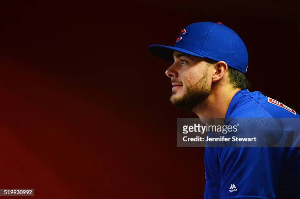 Kris Bryant of the Chicago Cubs sits in the dugout prior to the game against the Arizona Diamondbacks at Chase Field on April 8, 2016 in Phoenix,...